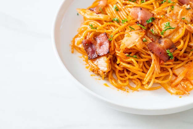 stir-fried spaghetti with kimchi and bacon - fusion food style