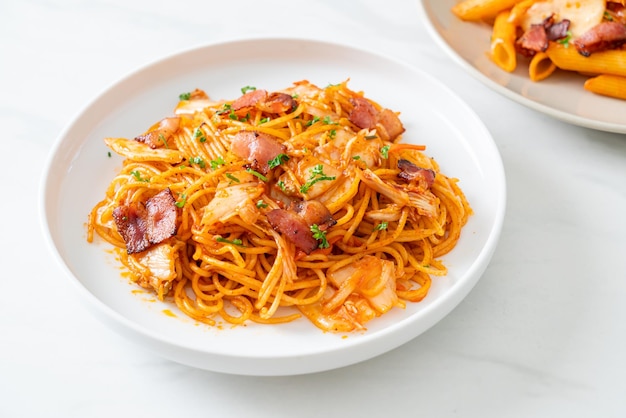 stir-fried spaghetti with kimchi and bacon - fusion food style