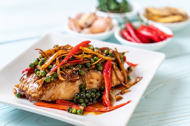 stir-fried spicy and herb with grouper fish fillet 