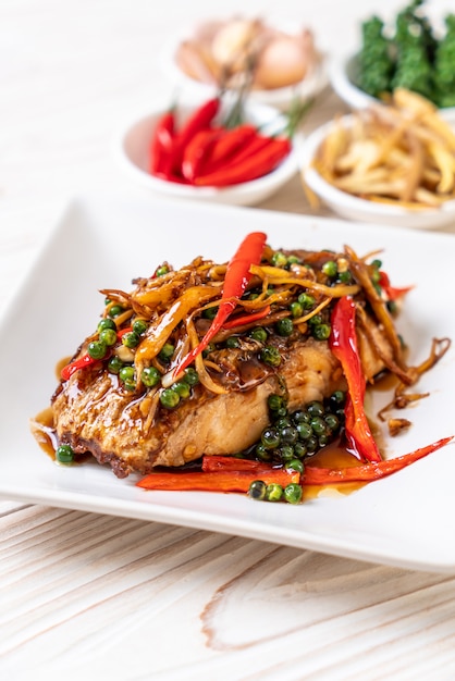 stir-fried spicy and herb with grouper fish fillet 