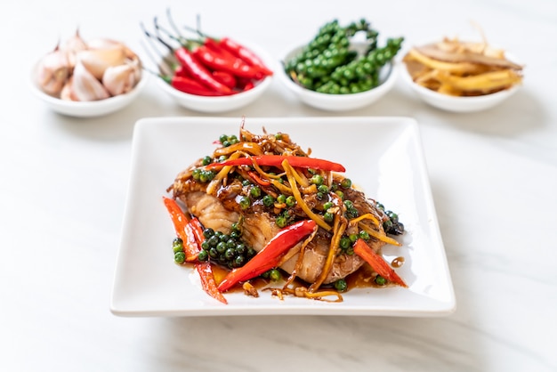 stir-fried spicy and herb with grouper fish fillet 