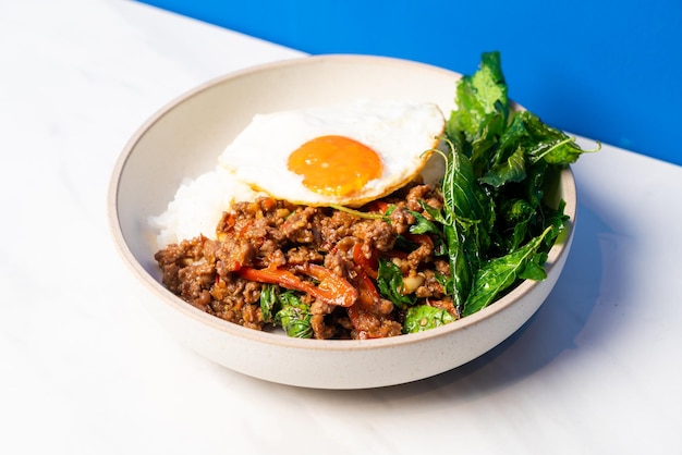 Stir fried Thai basil with wagyu beef and fried egg