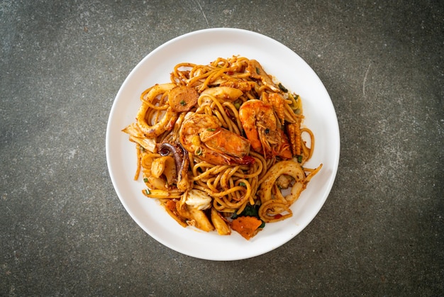 stir fried Tom Yum seafood dried spaghetti - Fusion food style