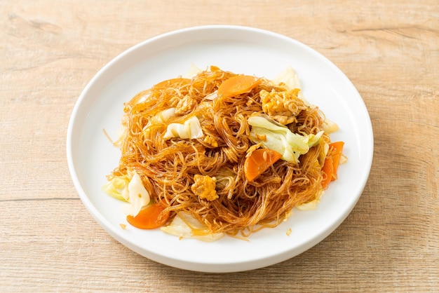 stir fried vermicelli with cabbage, carrot and egg - vegan food style