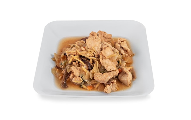 Stirfried chicken with ginger and mushroom on dish over white background