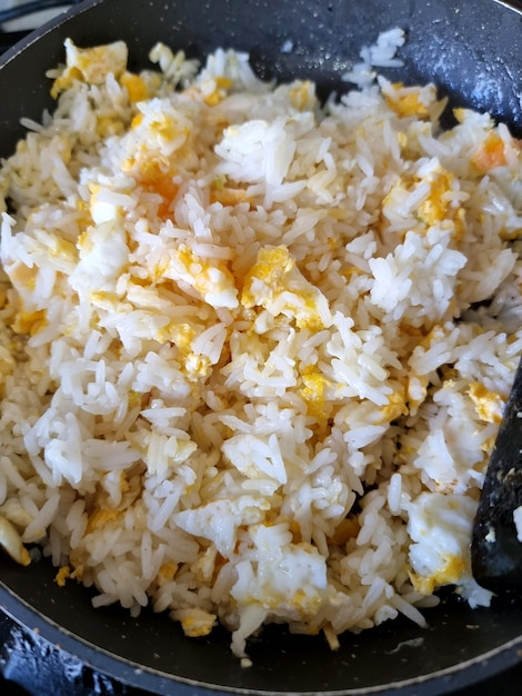 Stirfried egg fried rice in the pan