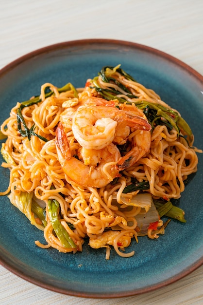 Stirfried instant noodles sukiyaki with shrimps