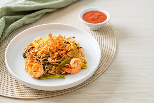 Stirfried instant noodles sukiyaki with shrimps