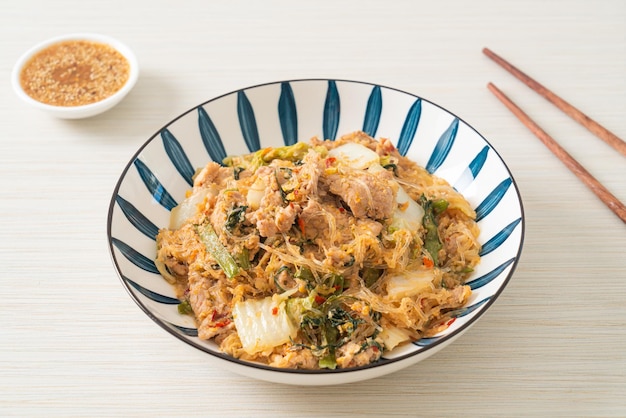 StirFried Thai Styled Sukiyaki or Stirfried vermicelli with pork and vegetables in sukiyaki sauce  Asian food style