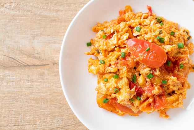 Stirfried tomatoes with egg or Scrambled eggs with tomatoes