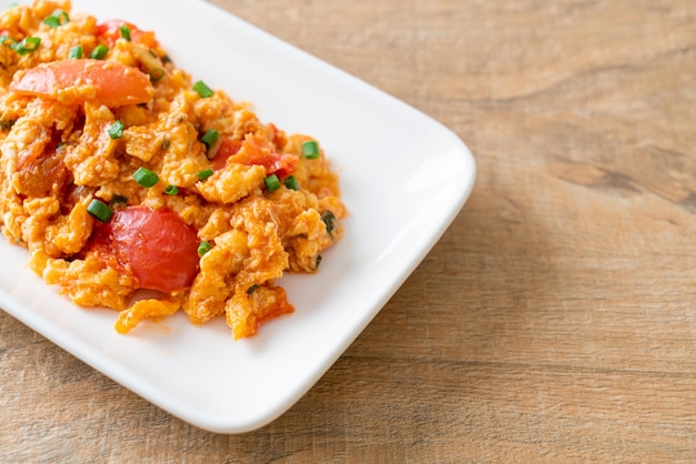 Stirfried tomatoes with egg or Scrambled eggs with tomatoes