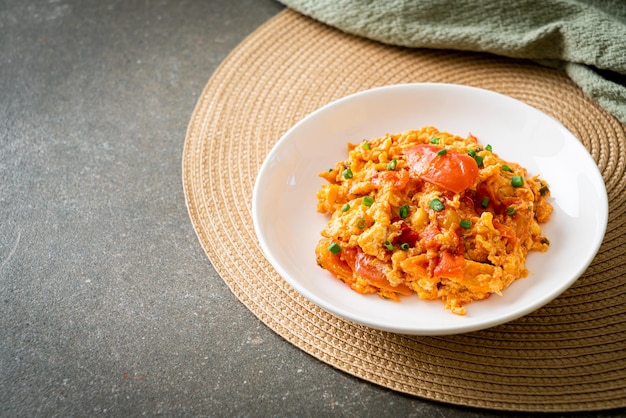 Stirfried tomatoes with egg or Scrambled eggs with tomatoes