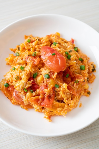 Stirfried tomatoes with egg or Scrambled eggs with tomatoes