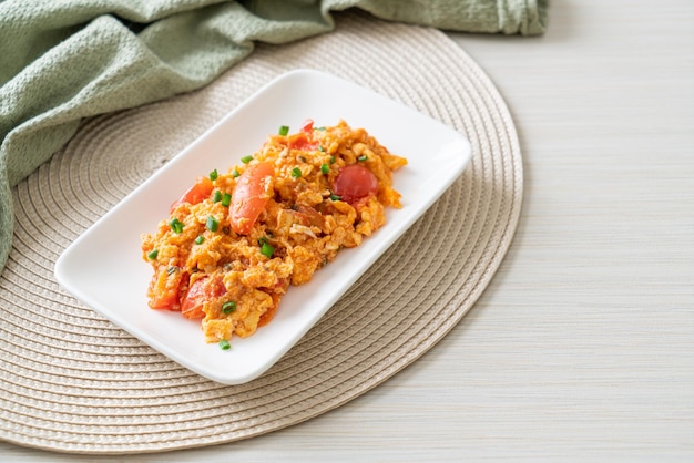 Stirfried tomatoes with egg or Scrambled eggs with tomatoes