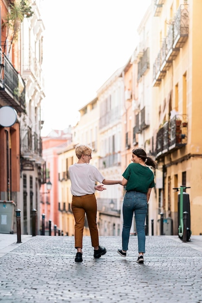 Stock photo of Lesbian couple loving They are walking and having fun together They are on a date