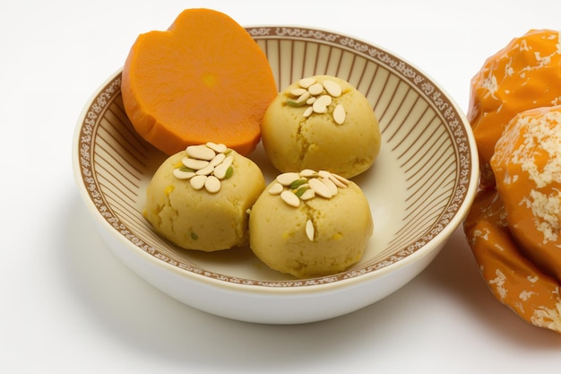 Stock that Orange Motichur Laddu and Kaju Katley Indian Sweets