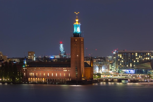 Stockholm city hall or stadshuset at night in the old town in stockholm capital of sweden