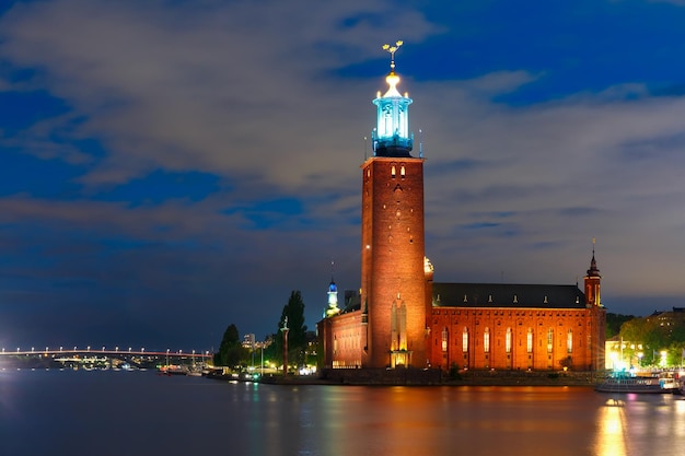 Stockholm city hall or stadshuset at night in the old town in stockholm capital of sweden