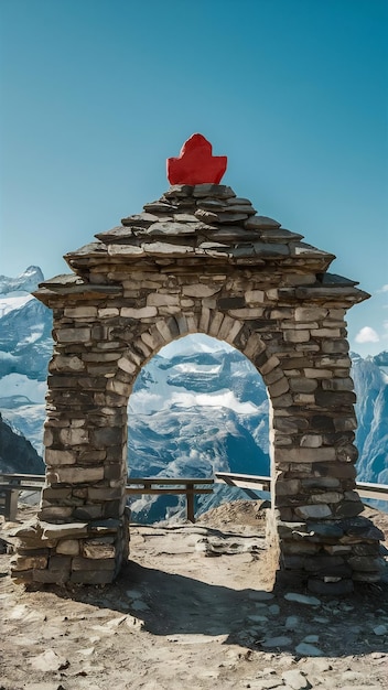 Stone arch with red stone at top at famous jungfraujoch top of europe switzerland