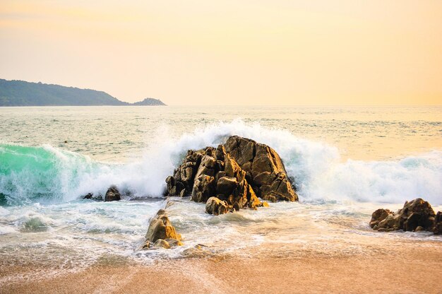 Stone on the beach in twilight laem sing beach phuket