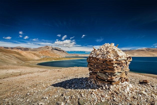 Stone cairn at Himalayan lake Tso Moriri