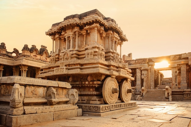 Stone chariot in Hampi Vittala Temple at sunset