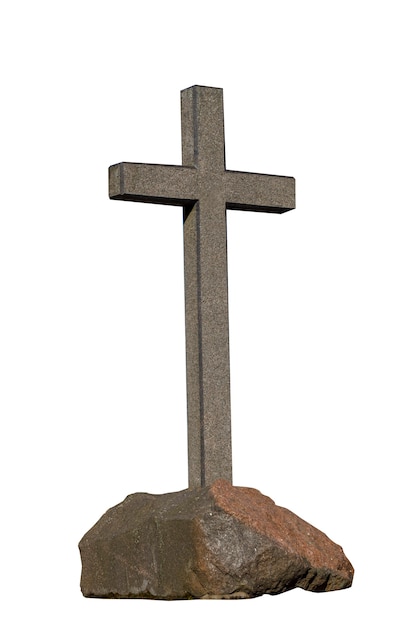 Stone cross on a stone isolated on a white background. religious concept. High quality photo