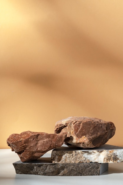 Stone display mockup for advertising against beige background