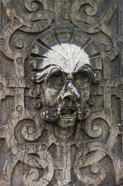 Stone Face Sculpture in the Old City of Solothurn. Solothurn is the capital of Solothurn canton in Switzerland. It is located on banks of the Aare and on the foot of Weissenstein Jura mountains