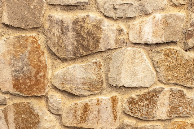 Stone fence or wall, closeup background texture