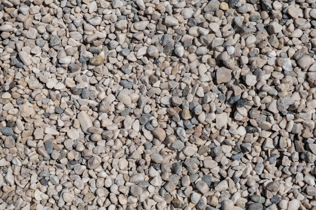 Stone gravel texture at a construction site or beach background