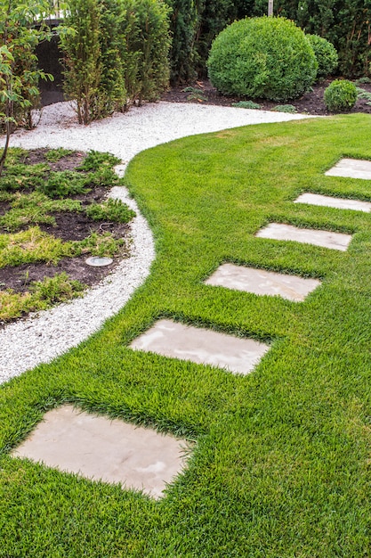 Stone path in the garden of stone slabs