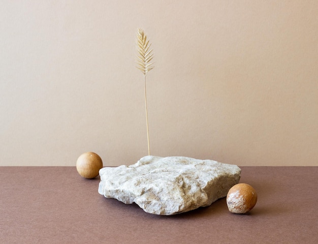 A stone podium on a beige background Presentation of cosmetics Mockup Copy space