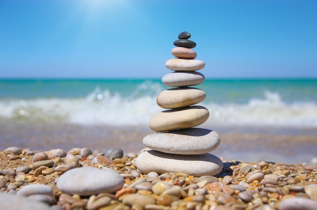 Stone pyramid on a seashore Relax composition