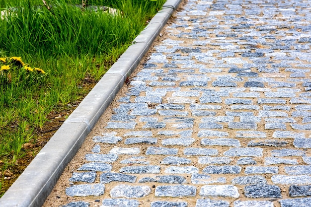 Stone road stone sidewalk curb