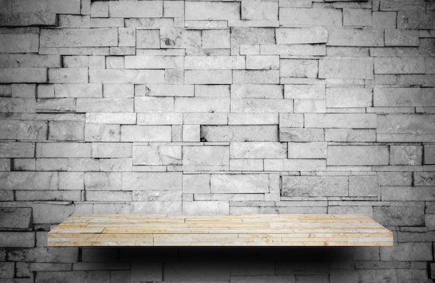 Stone rock shelf counter on gray rock layer for product display