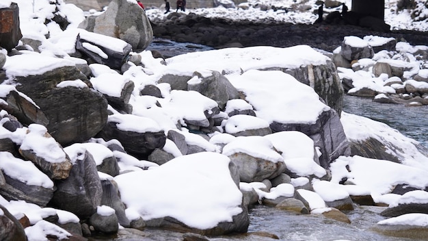 Stone and snow heavy snowfall concept image