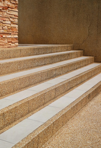 Stone stairway leading up to a modern building