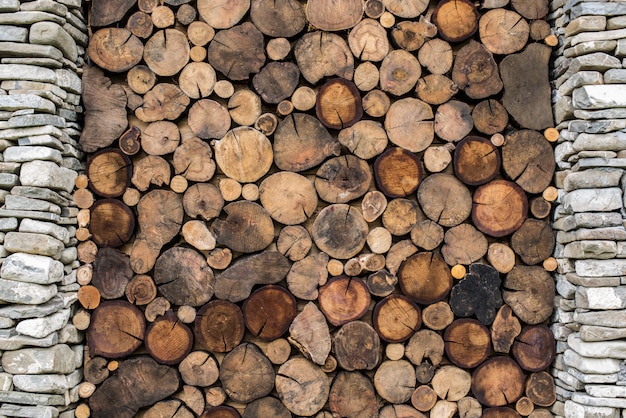 Stone and wood background. Building with stone column and wood cross section texture.