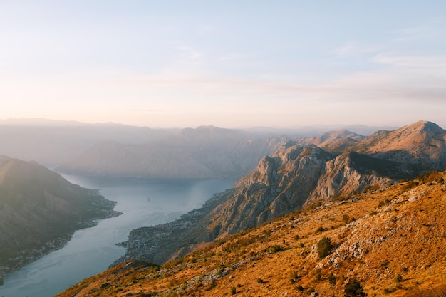 Stony mountains in the fog over the kotor bay mount lovcen