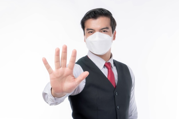 Stop Civid-19 , Asian man wearing Face Mask protect spread Covid-19 Coronavirus on white background