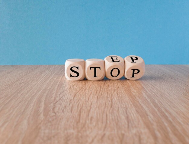 Stop or next step symbol Turned cubes and changes the word 039stop039 to 039step039