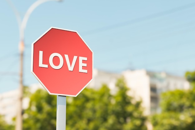 Stop traffic sign with the word LOVE