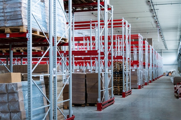 Storage warehouse and racks on which there are cardboard boxes with finished products