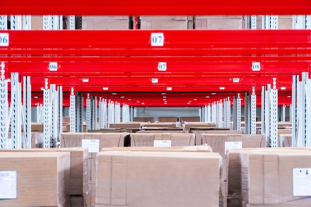 Storage warehouse and racks on which there are cardboard boxes with finished products