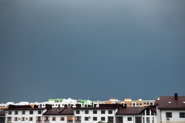 Storm clouds gather over a residential housing estate