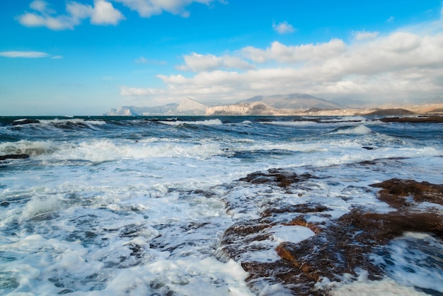 Storm on the sea coast in the afternoon