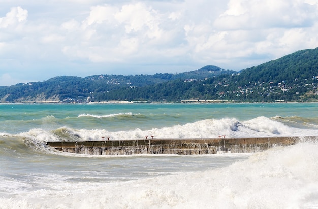 Storm surges and breakwater. Stormy weather.