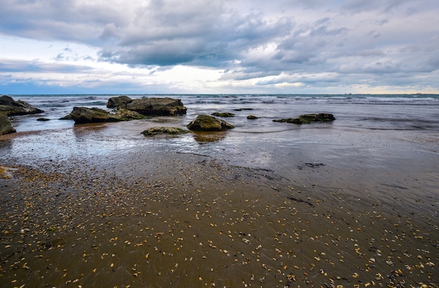 Stormy sea and rocky coast beautiful dramatic sky