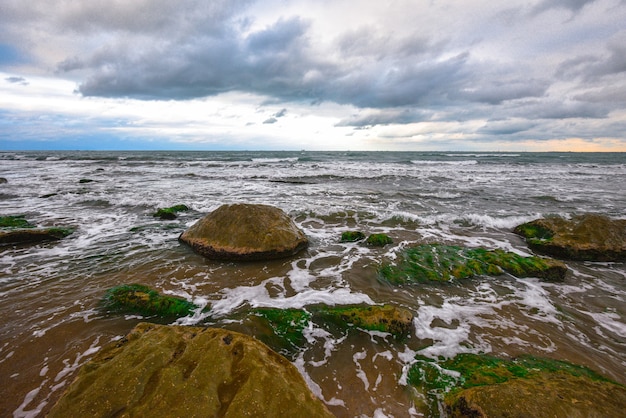 Stormy sea and rocky coast beautiful dramatic sky